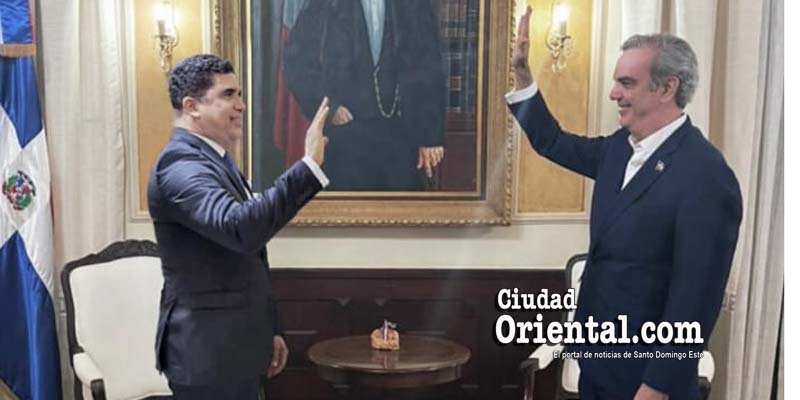 Dío Astacio (i) y Luis Abinader